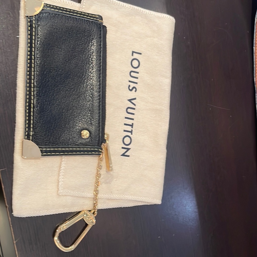 Louis Vuitton black leather cc key chain.